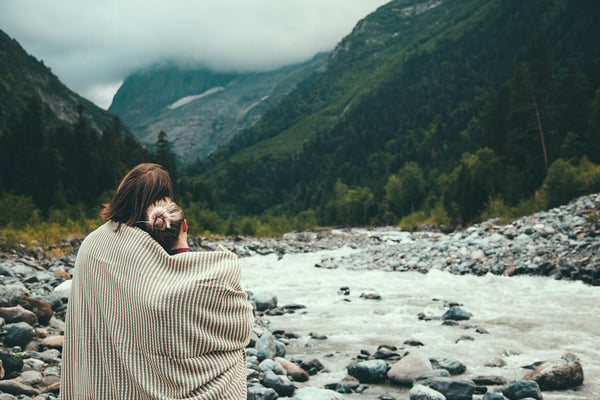 Couple wrapped in blanket