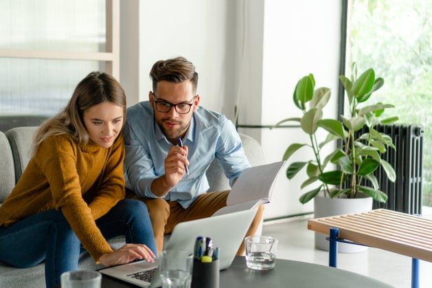 A couple researching the CARES Act