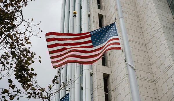 American flag in front of government building