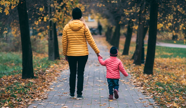 mother and child walking