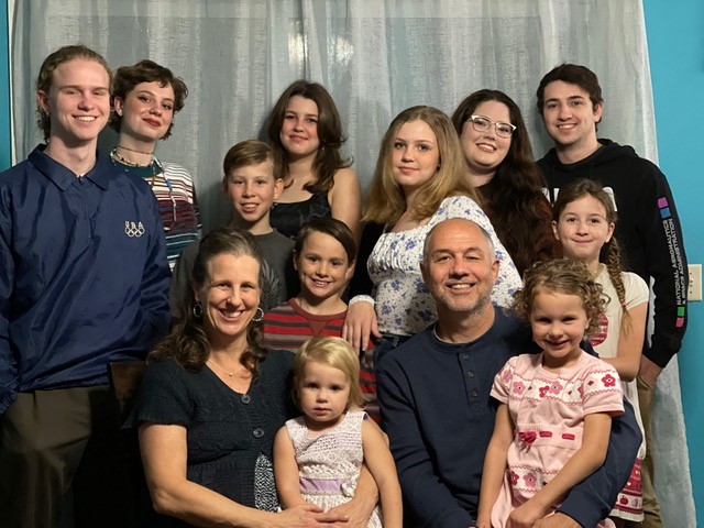 Large happy family posed for a family picture