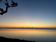 Camping out in nature, looking at the water