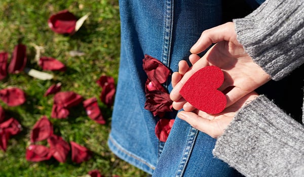 Hands holding a heart