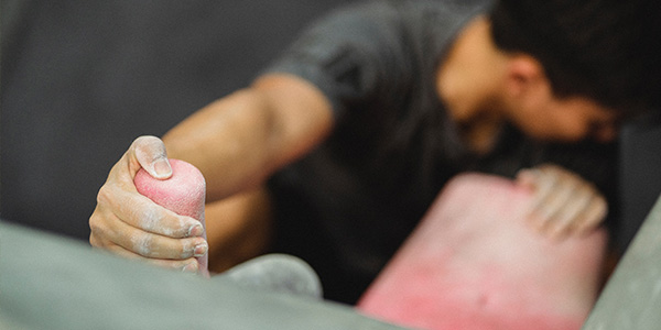 Man rock climbing in a gym