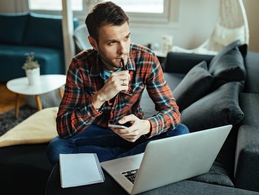 Man thinking at the computer
