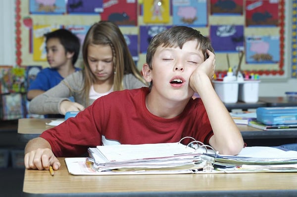 Sleepy kid in class