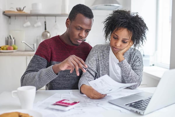 Couple looking over their budget