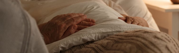 Senior man comforting his wife