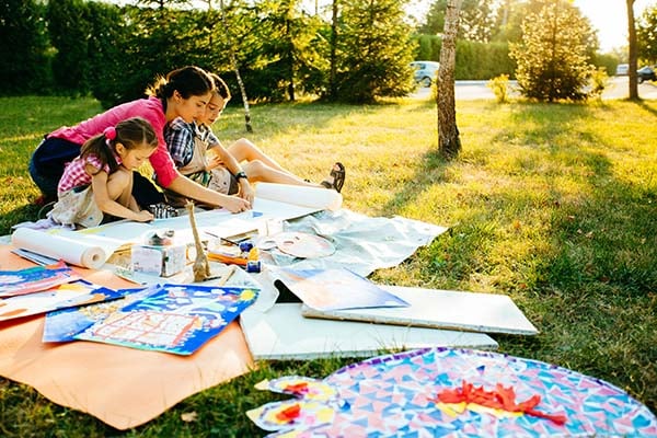 Mom painting with her kids