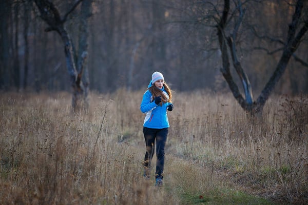 Woman running in cold weather