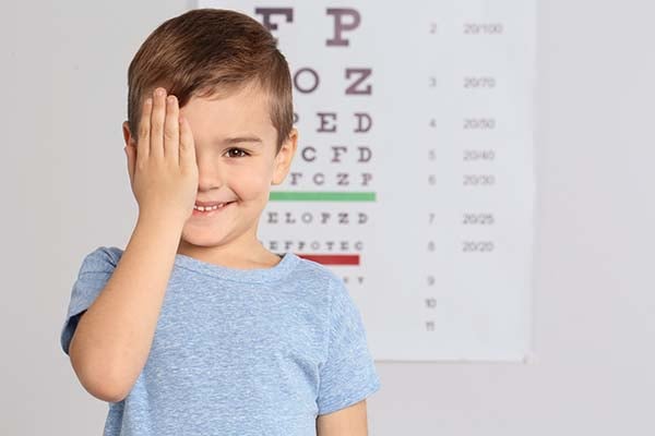 Child taking an eye exam