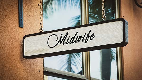 Midwife business sign