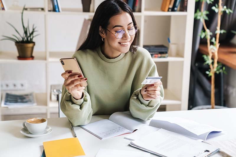 College student using credit card