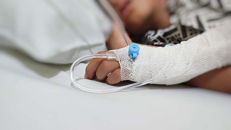 Boy in a hospital bed