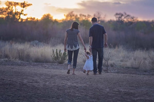 Young family walking together