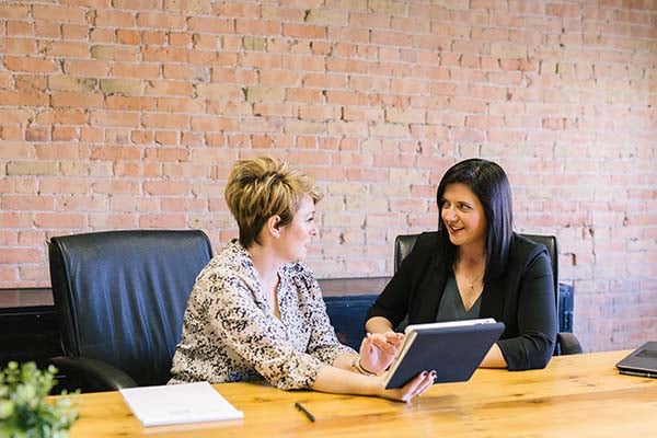 Women talking business