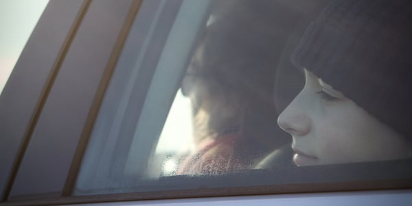 child looking out car window-1