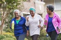 three women exercising 