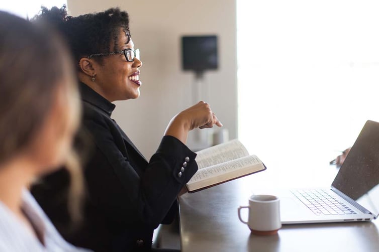 Business owner reading the Bible
