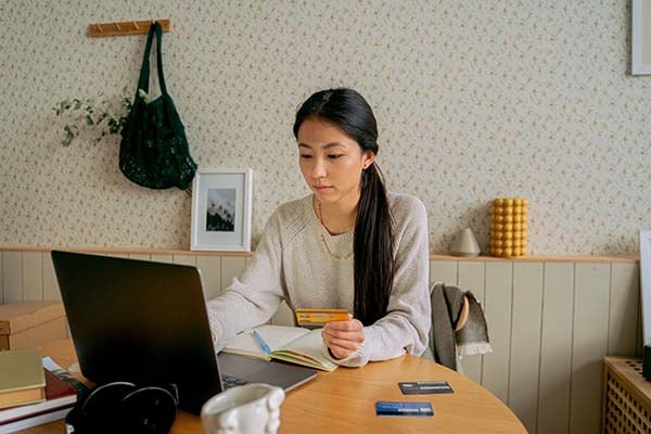 Woman using a credit card