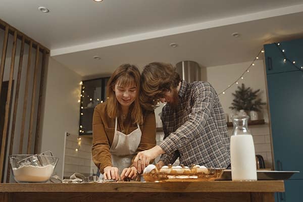 Couple baking together