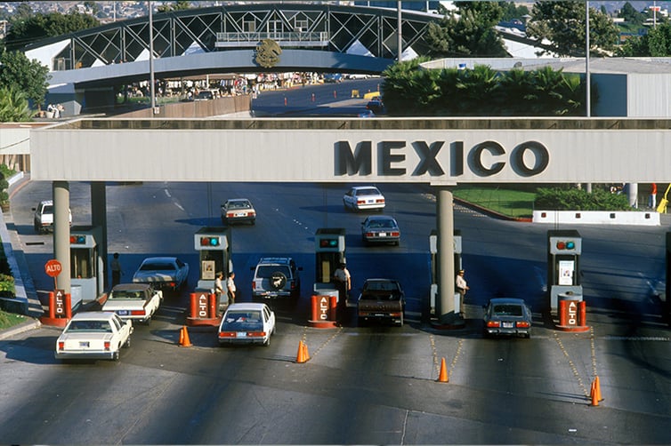 Cars crossing the border into Mexico from the United States