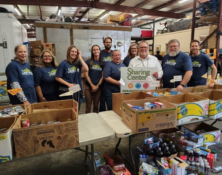 Medi-Share volunteers sorting donated food at the Sharing Center of Central Brevard