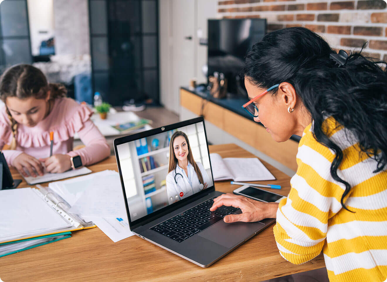 Woman accessing a telehealth call that is included with Medi-Share's health care sharing ministry.