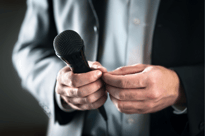 Man holding a microphone