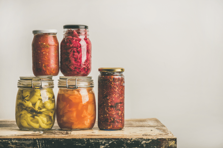 five jars of fermented food 