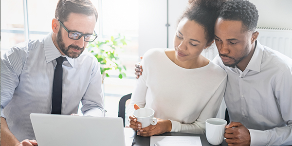 couple meeting with financial planner