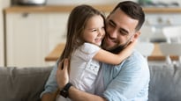 Father hugging his daughter