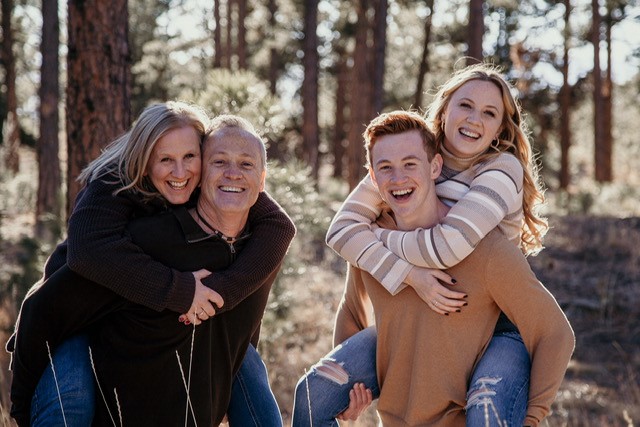 family picture of mother, father, daughter, and son