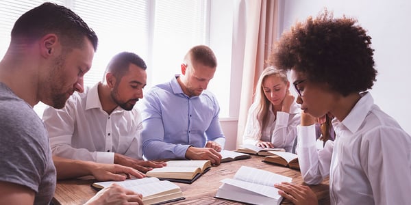 A group of business owners having a Bible study