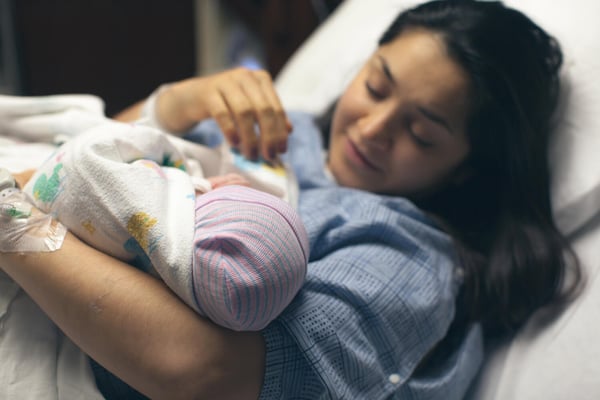 Mother holding her newborn baby