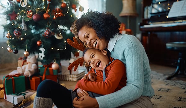 mom hugging son in christmas