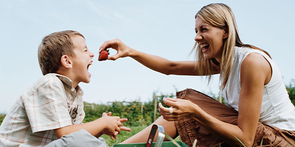 mother and son on a picnic