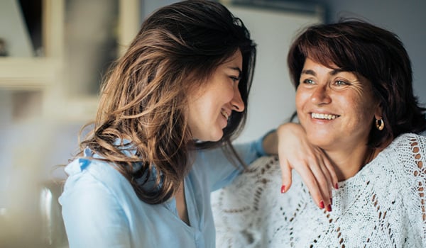 mother daughter smiling