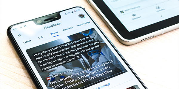 news headlines displayed on a smart phone