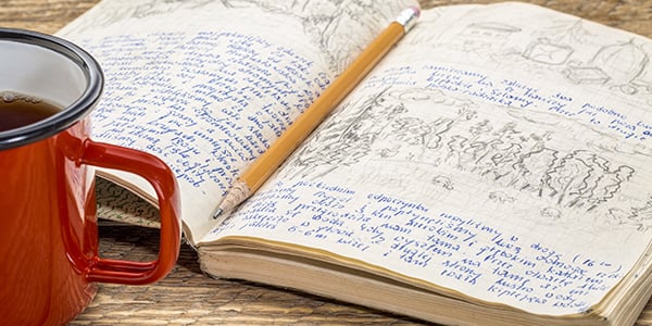 open journal with writing