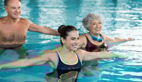 people exercising in a pool
