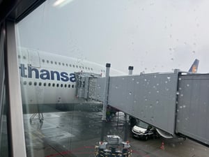 an airplane being boarded at an airport