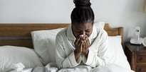 sick girl in bed