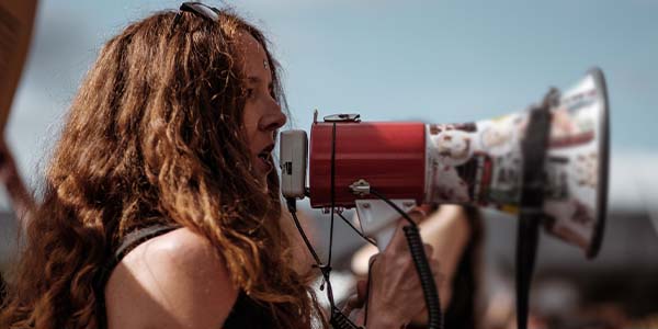 woman with megaphone talking