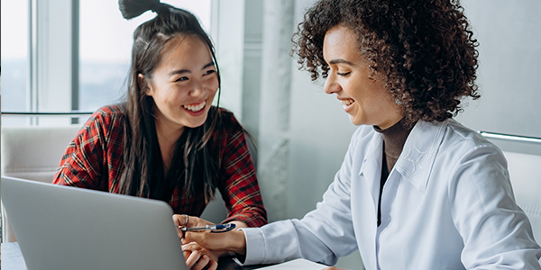 women working together on computer