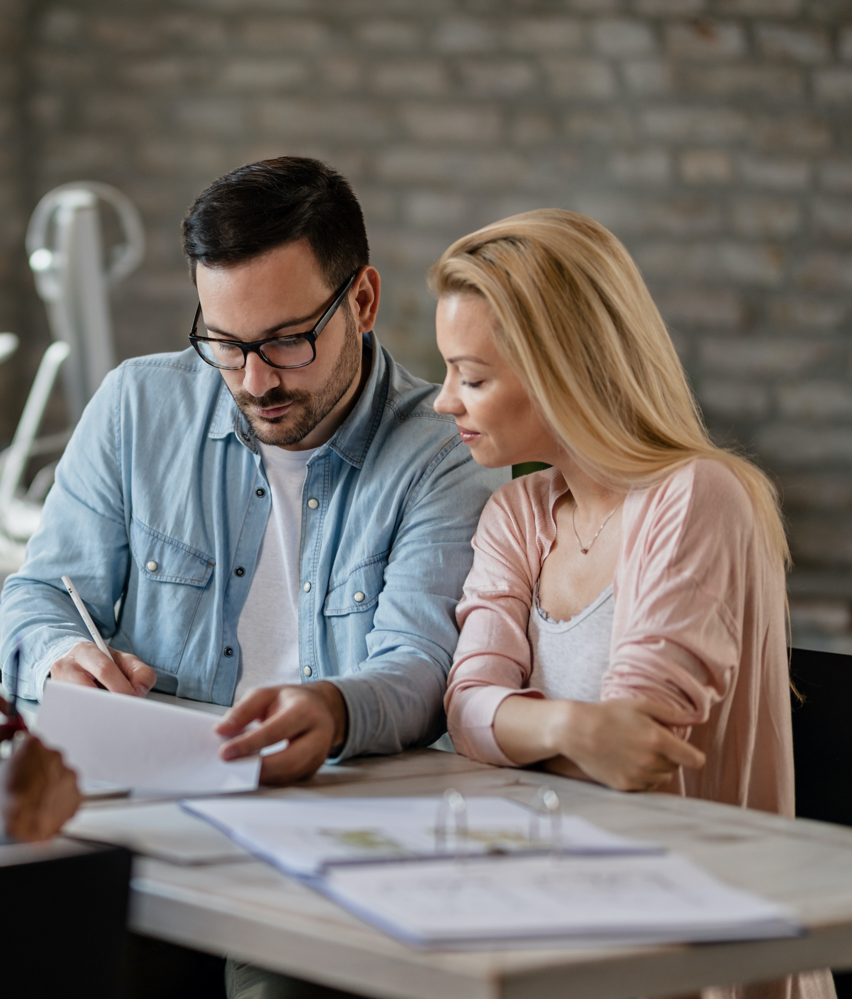 Couple reviewing paperwork