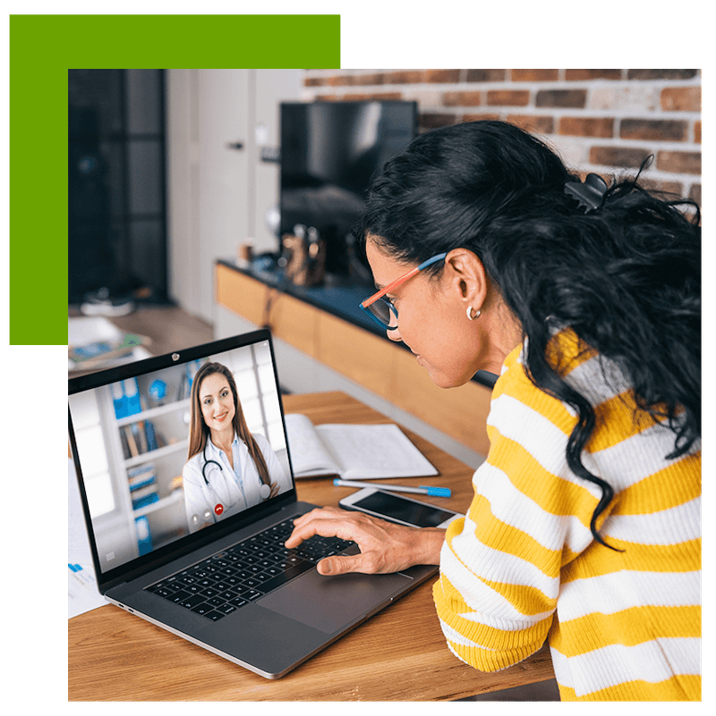 Woman Using Laptop for TeleMedicine 