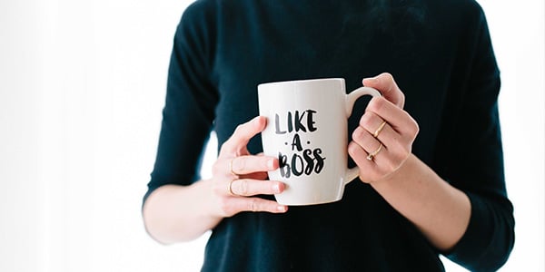 girl holding coffee cup 